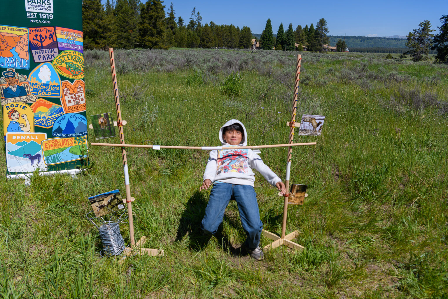A young man doing the limbo